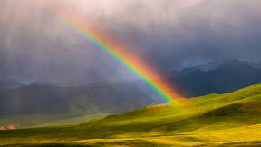Rainbow across the Kakshaal Too mountains, Kyrgyzstan