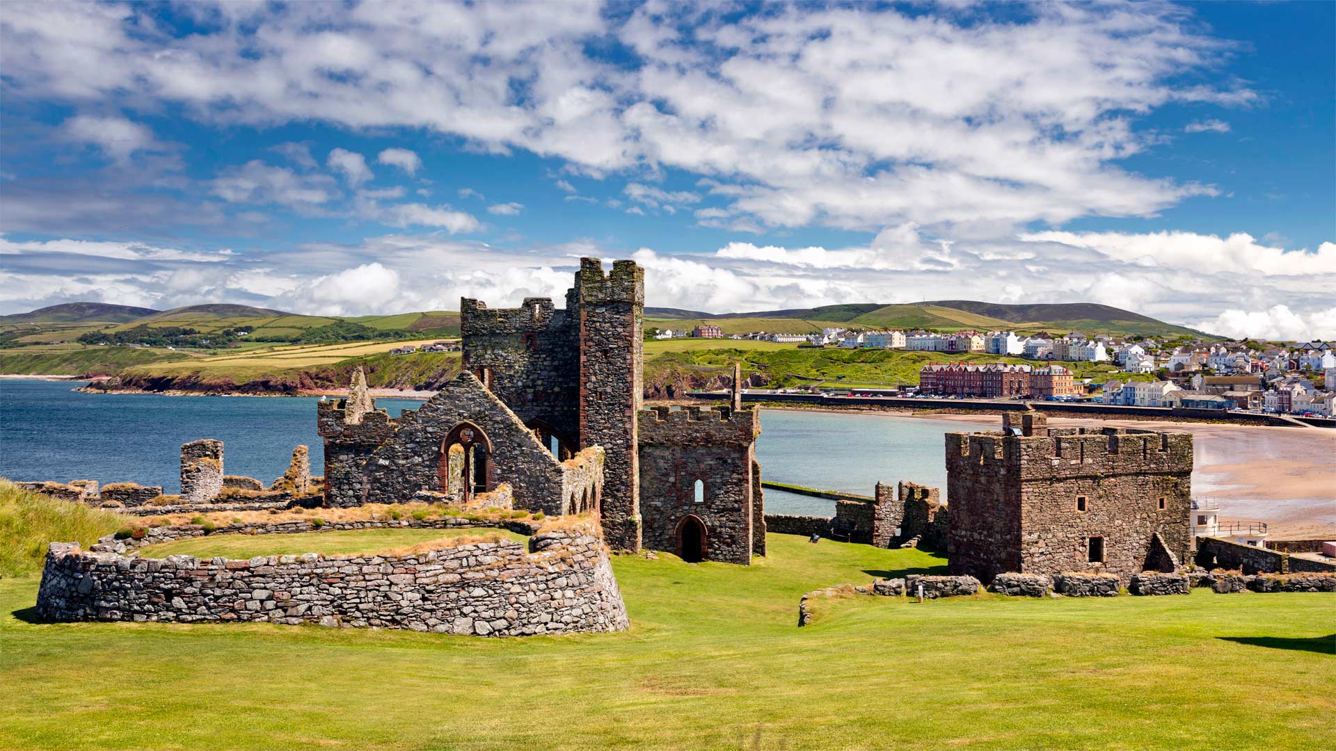 Peel Castle on St. Patrick’s Isle with the Isle of Man in the background
