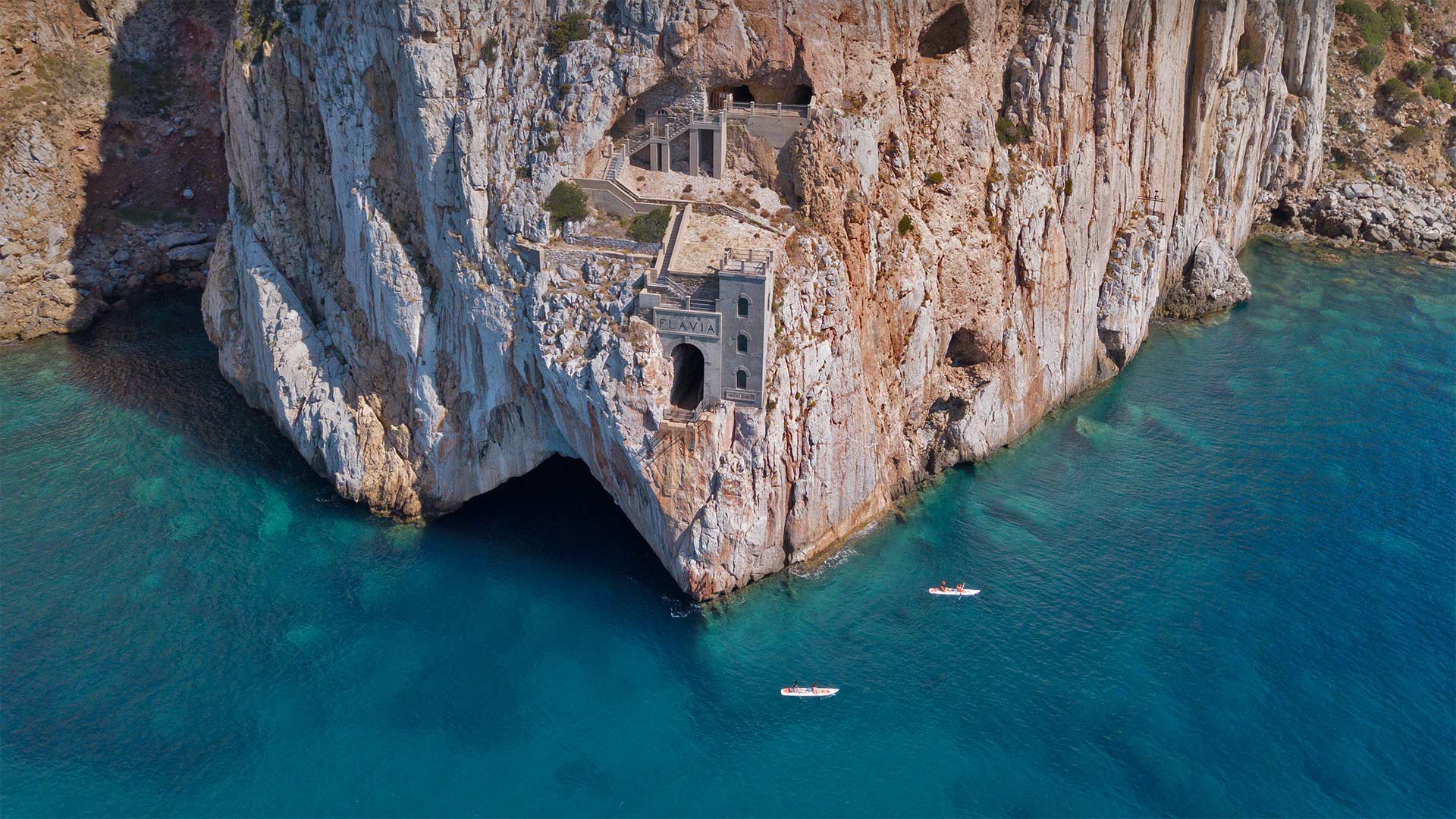 A cliffside harbor in Sardinia