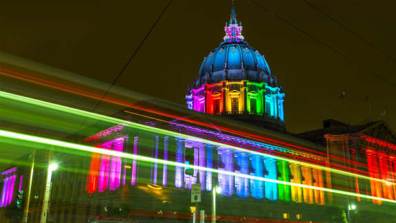 San Francisco’s City Hall illuminated by the iconic colors of Pride