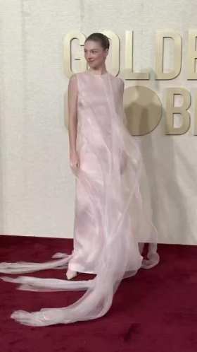 Hunter Schafer looks so beautiful in a pink dress with flying ribbons short MP4 video