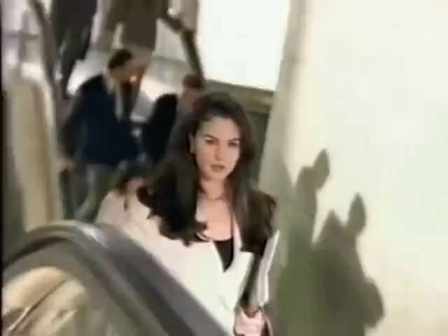 Monica Bellucci shoots advertisement as a office lady short MP4 video