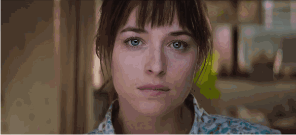 dakota johnson bites her lip