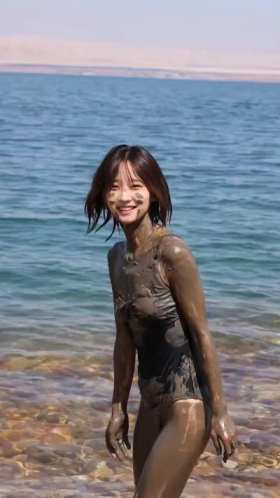 Beautiful girl covered in Dead Sea mud short MP4 video