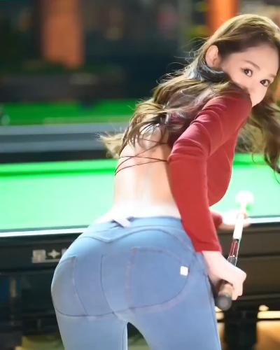 The girl playing billiards