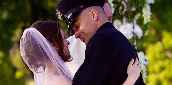 Bride and groom kiss GIF