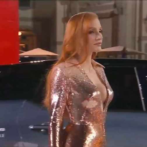 Jessica Chastain gold shiny deep V dress short MP4 video