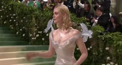 Elle Fanning appears on the Met Gala red carpet as "Ice Garden Princess"