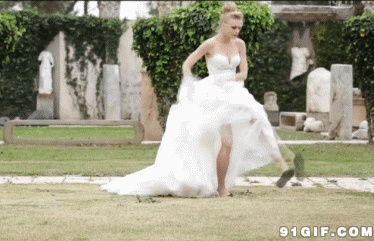 The bride kicked off her shoes GIF