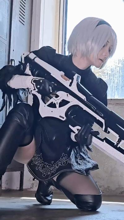 Anime girl picks up a gun