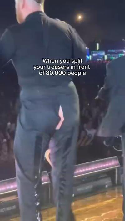 Sam Smith split his trousers in front of 80,000 people GIF