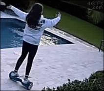 Girl riding a balance bike GIF