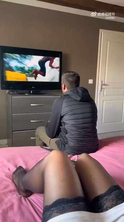 the beautiful woman in black stockings take off bra, her husband play as Spider Man short MP4 video