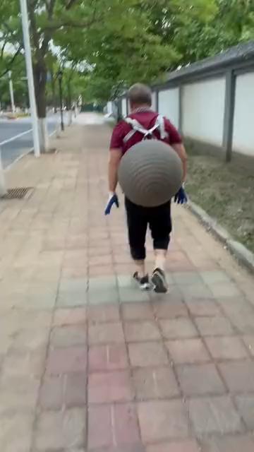 Somersault while carrying a balloon