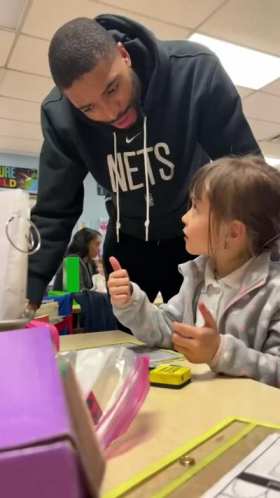 Mikal Bridges teaches children how much 2+7 equals short MP4 video