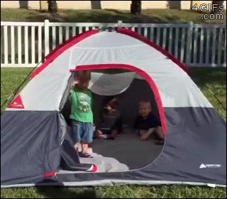 Kids trip on tent GIF