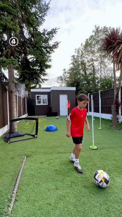 boy doing football training