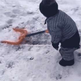 child shoveling snow