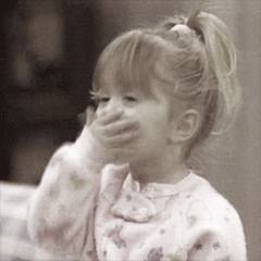 baby blowing kisses GIF