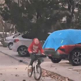 wearing a hat to ride a bicycle is cool GIF