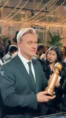 Nolan with his Golden Globes Award  short MP4 video
