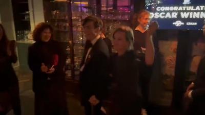 Cillian Murphy holds hands with wife Yvonne McGuinness to celebrate winning Oscar GIF