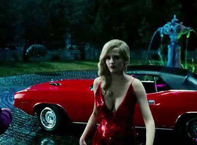 Eva Green, red deep V skirt and red supercar