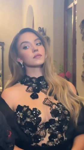 Sydney Sweeney's behind the scenes photoshoot at the 81st Venice Film Festival. short MP4 video