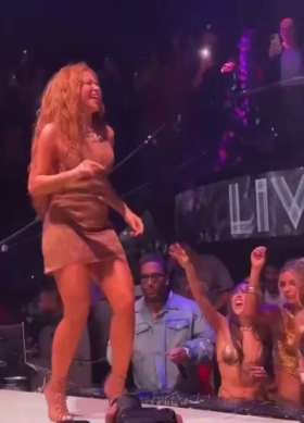 Shakira was secretly filmed under her skirt by an audience member while promoting her new song. short MP4 video