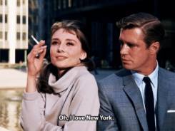 Audrey Hepburn smoking GIF