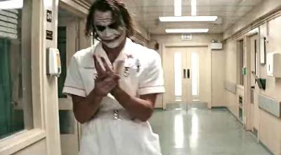 Joker (Heath Ledger) washes his hands