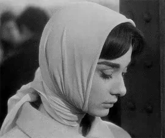 Audrey Hepburn in the 1957 film "Love in the Afternoon"​​​ GIF
