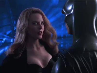 Nicole Kidman takes off her coat in front of Batman