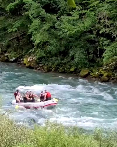 Nikola Jokic floats down a creek in his hometown