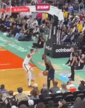 LeBron James hits a three pointer from the corner under the defense of Wembanyama short MP4 video