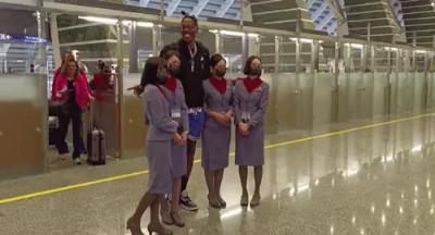 Howard took a photo with the stewardess