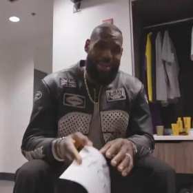 LeBron James holding a white piece of paper with 40,000 written on it short MP4 video