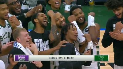 The Bucks are all looking at their watches