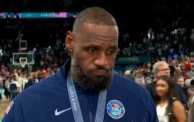 LeBron James hugs his son during an interview short MP4 video