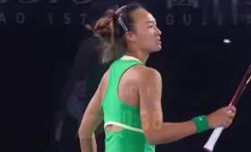 Zheng Qinwen Blows a Feather During a Match Break short MP4 video