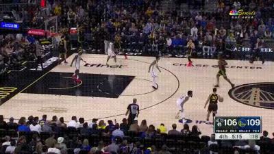 Stephen Curry hits a long three-pointer