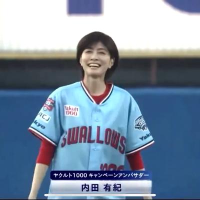 Yuki Uchida throws the first pitch with a bright smile
