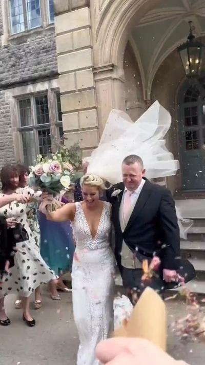 Bride's veil blows away and gets caught on church spire