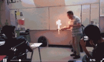 Teacher demonstrates 'exploding flames' in class