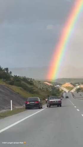 Rainbow on a highway in Malaysia short MP4 video