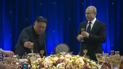 Putin and Kim Jong-un toast