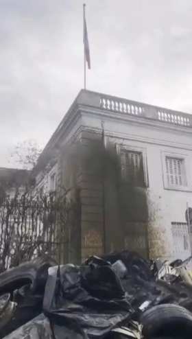 French farmers spray 17 tonnes of manure on city hall building short MP4 video