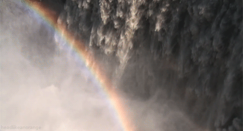 A rainbow created by a waterfall in Iceland