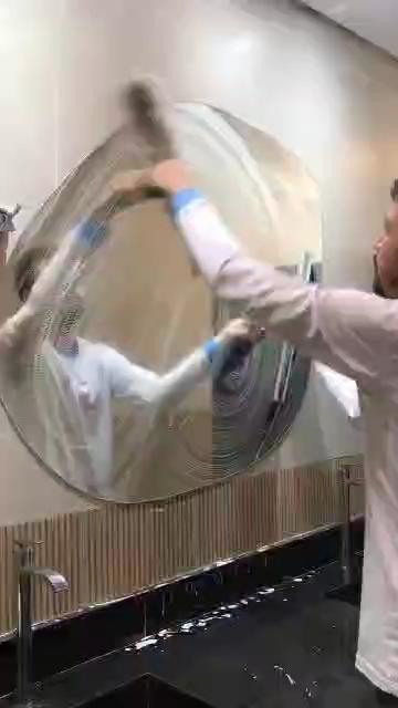 A skilled glass cleaner