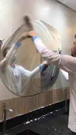 A skilled glass cleaner short MP4 video